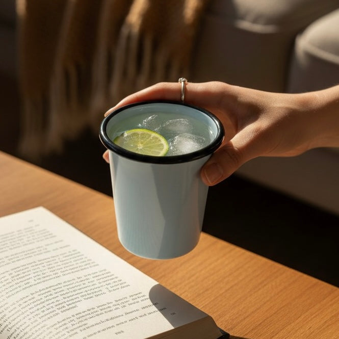 Cerulean enamel tumbler with cold tea in it