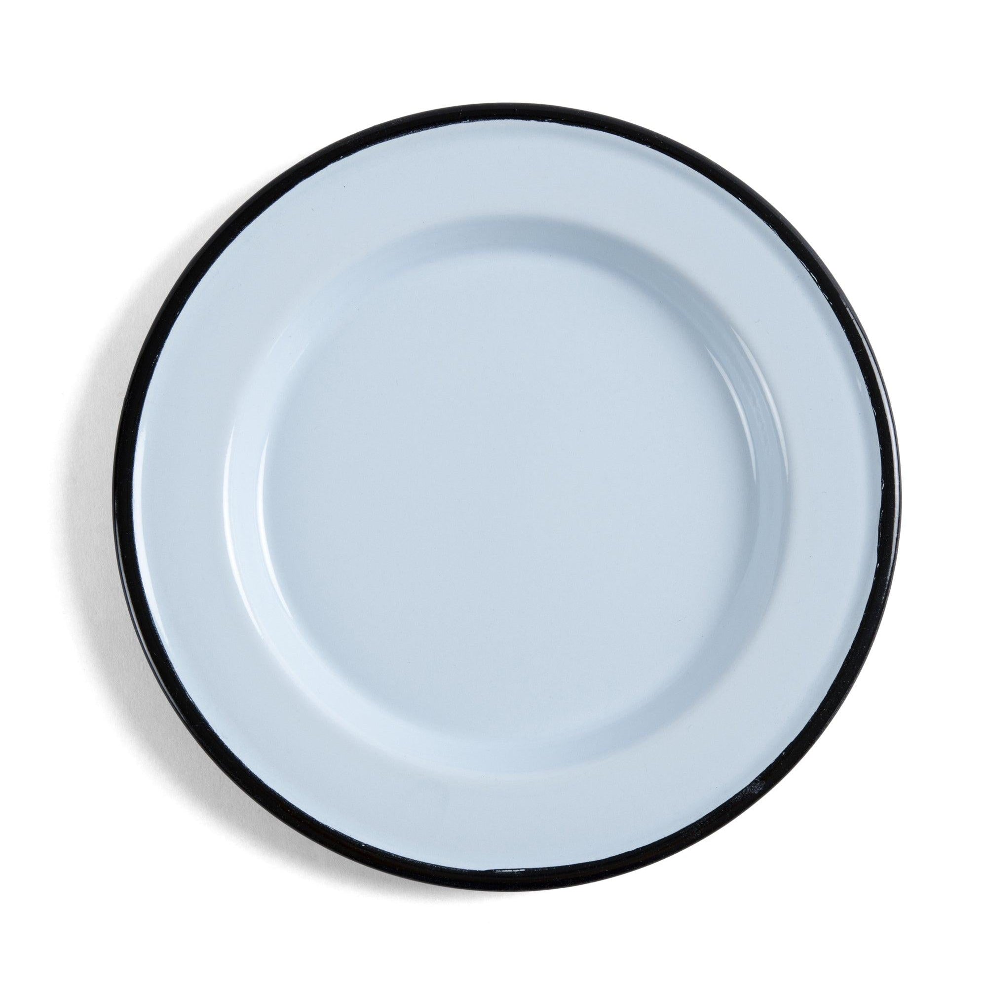 Light blue plate with black rim on a white background