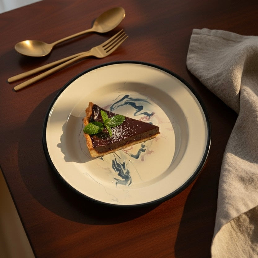 Pastry on candy swirl enamel plate